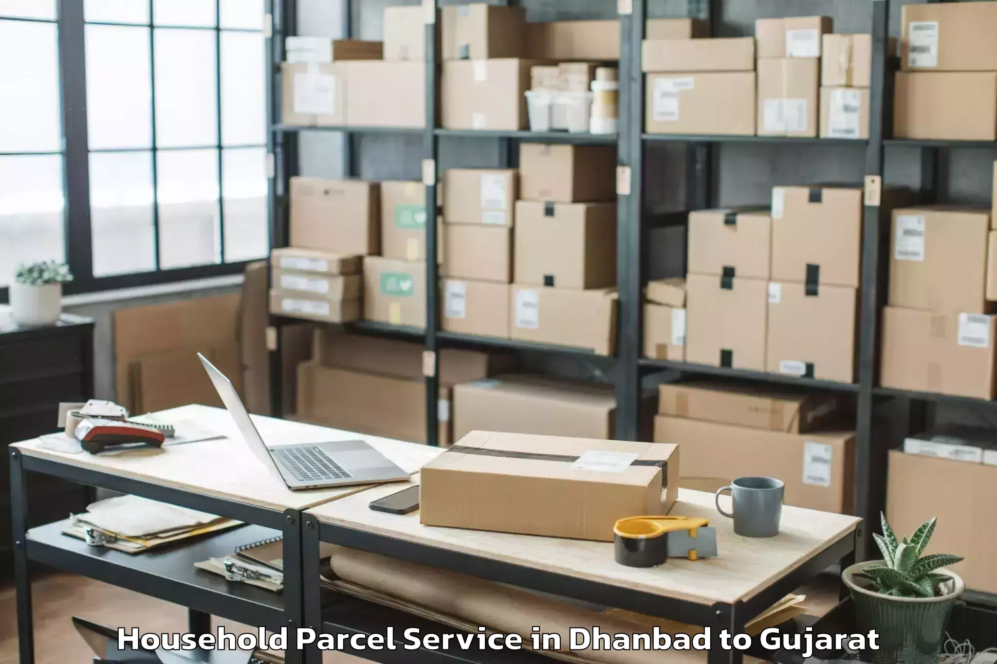 Book Your Dhanbad to Delvada Household Parcel Today